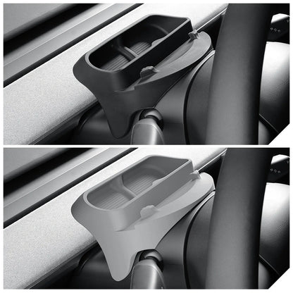 Car organizer tray in a vehicle interior.